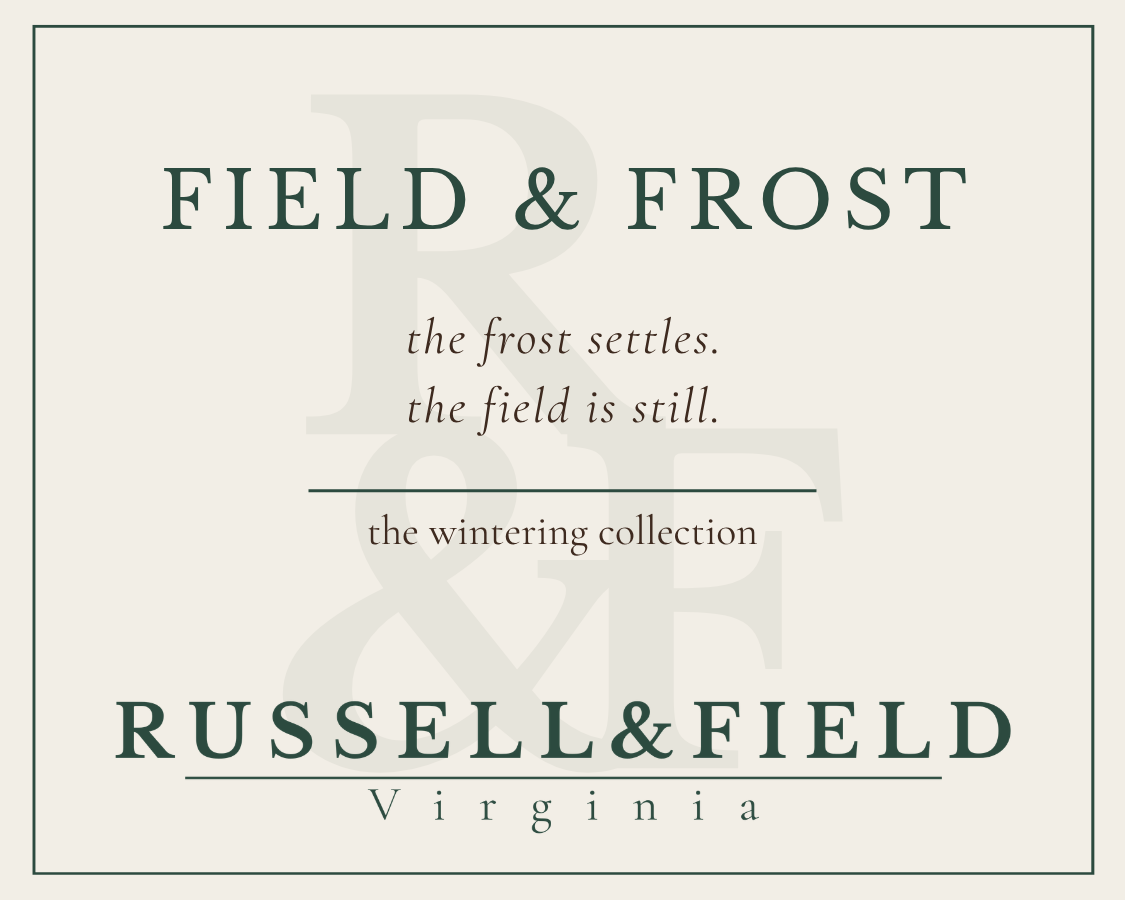Field and Frost candle label for Russell & Field Virginia, featuring the text 'FIELD  & FROST' and the line 'the frost settles. the field is still."
